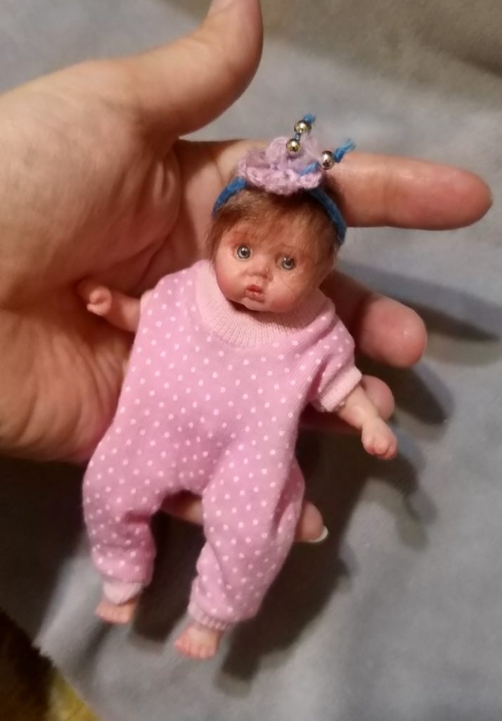 Silicone mini baby doll Nata 5 inch , painted, rooting hair, eyes open, open mouth with pacifier and bootle