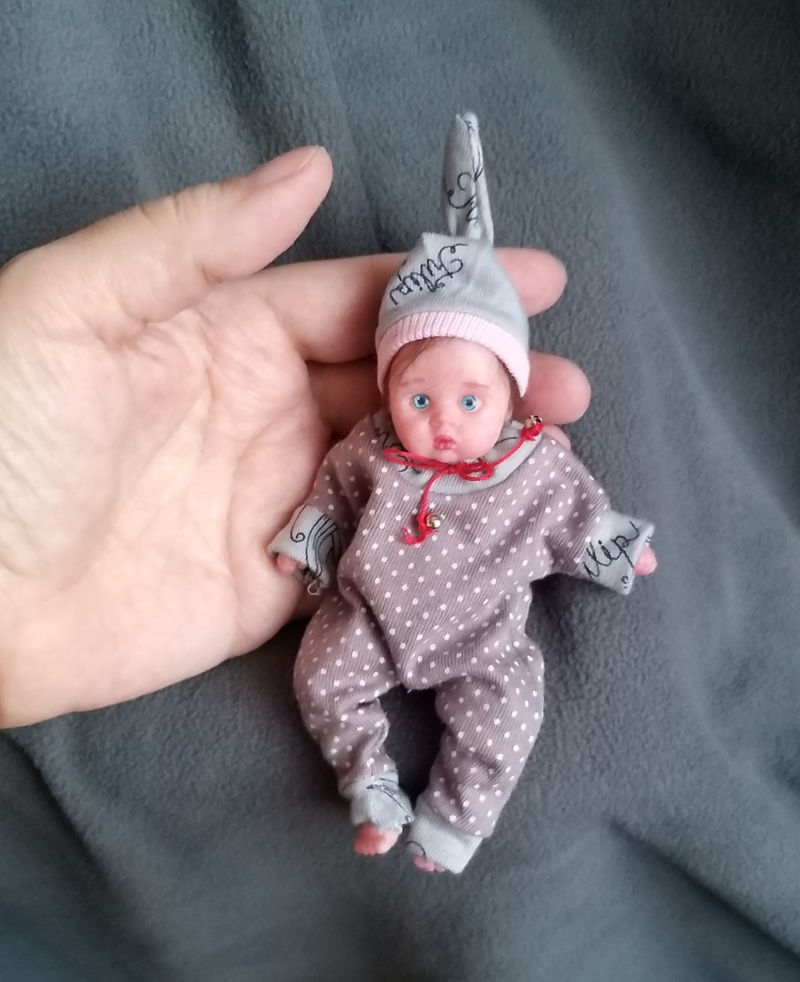 Minireborn  with pacifier and bootle, original clothes