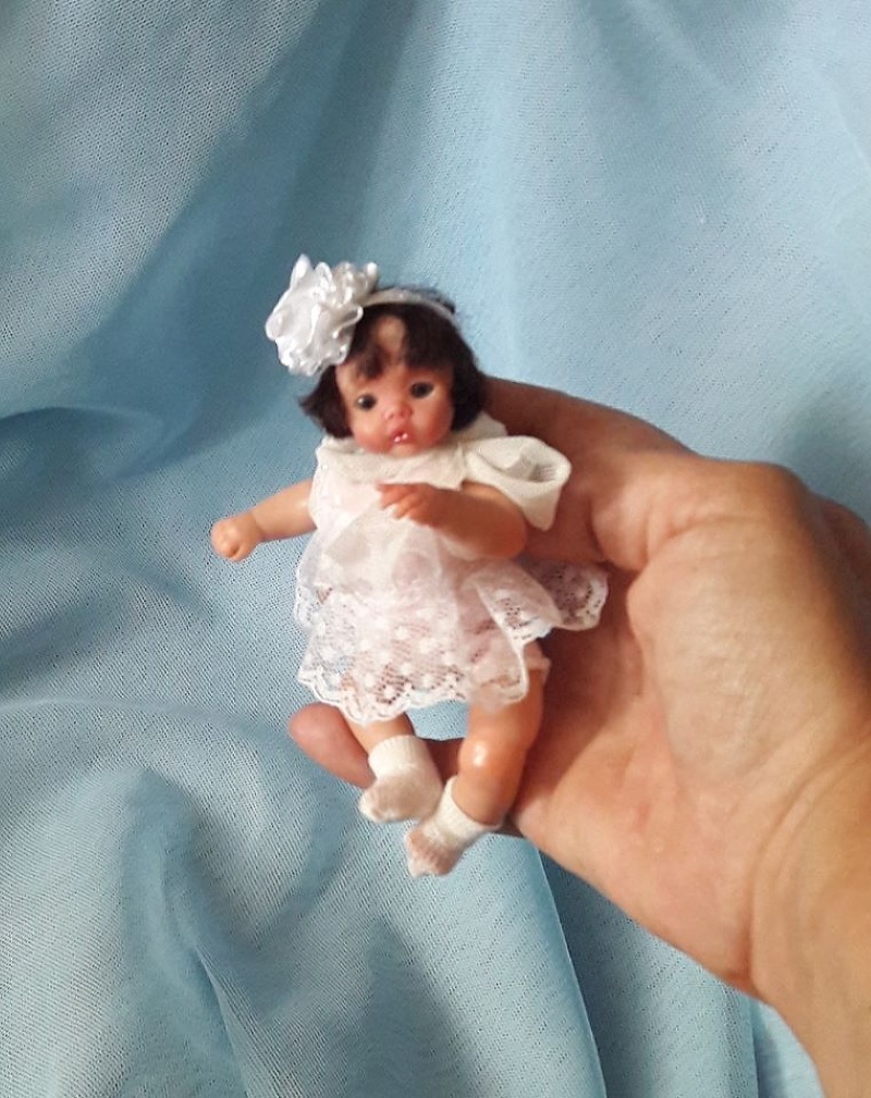 Mini polymer clay baby doll by Kovalevadoll