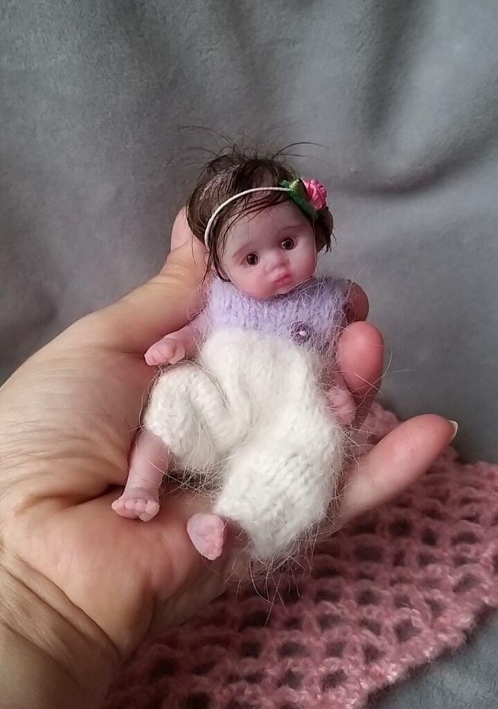 You can also order extra clothes for the miniature silicone doll