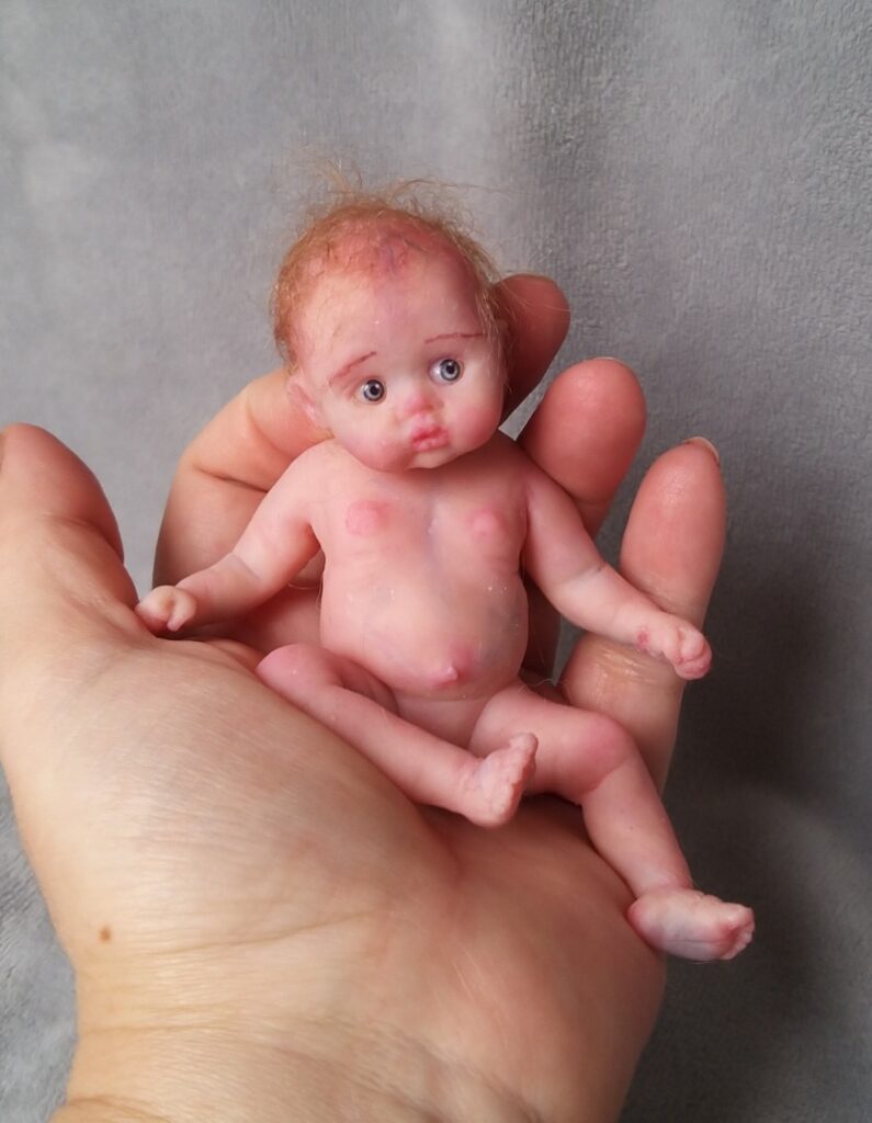 tiny miniature silicone baby